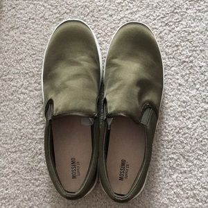 Green slip on sneakers